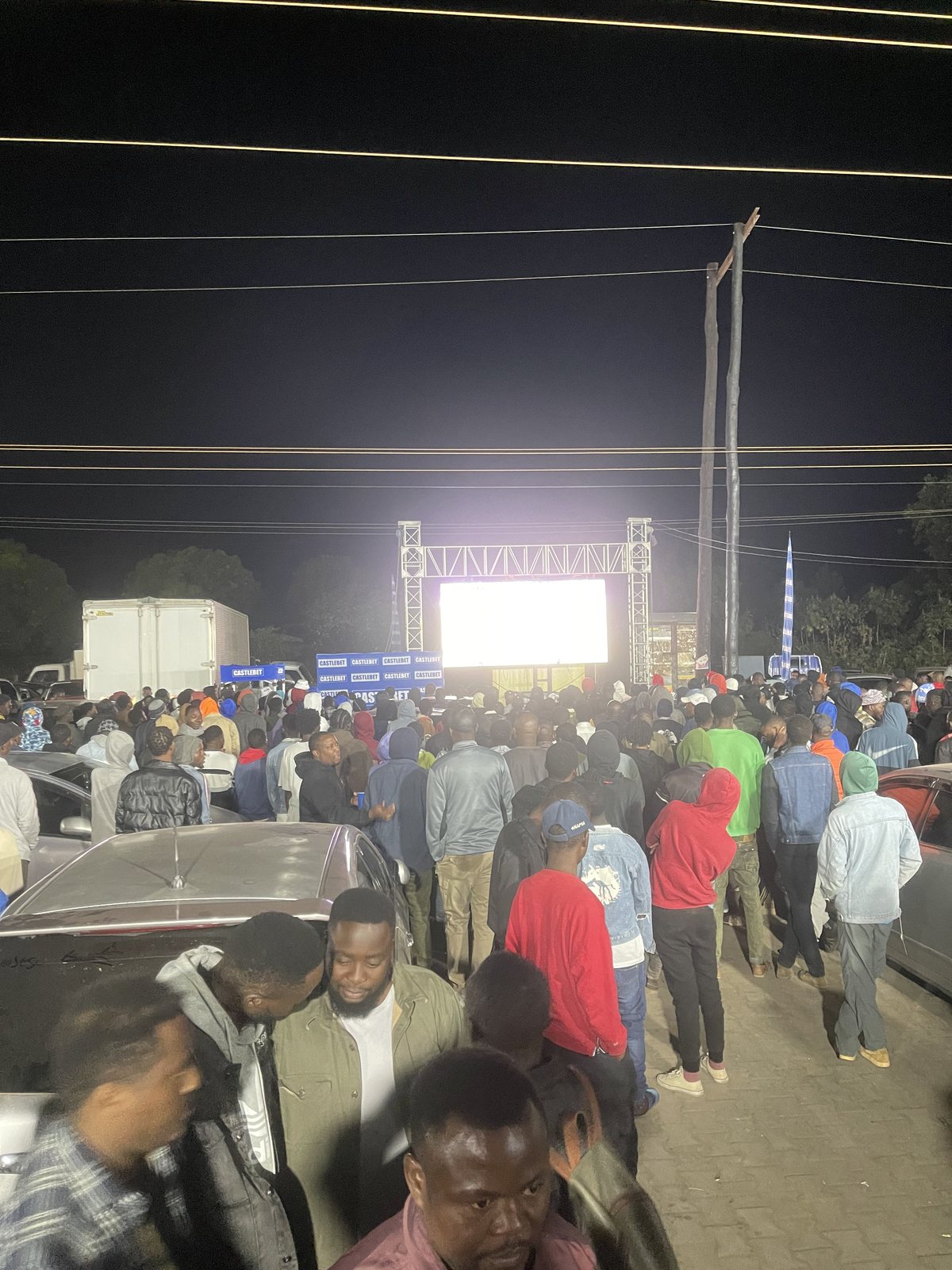 Audience turnout watching live football on the large activation screen